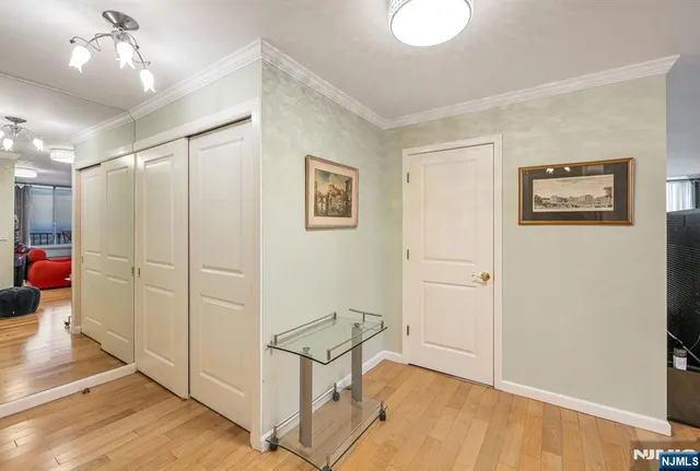 a view of a hallway with closet area