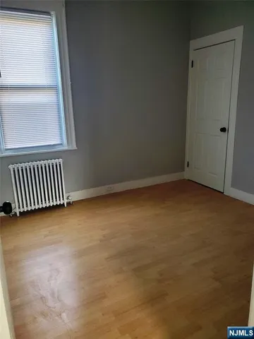 a view of kitchen with wooden floor