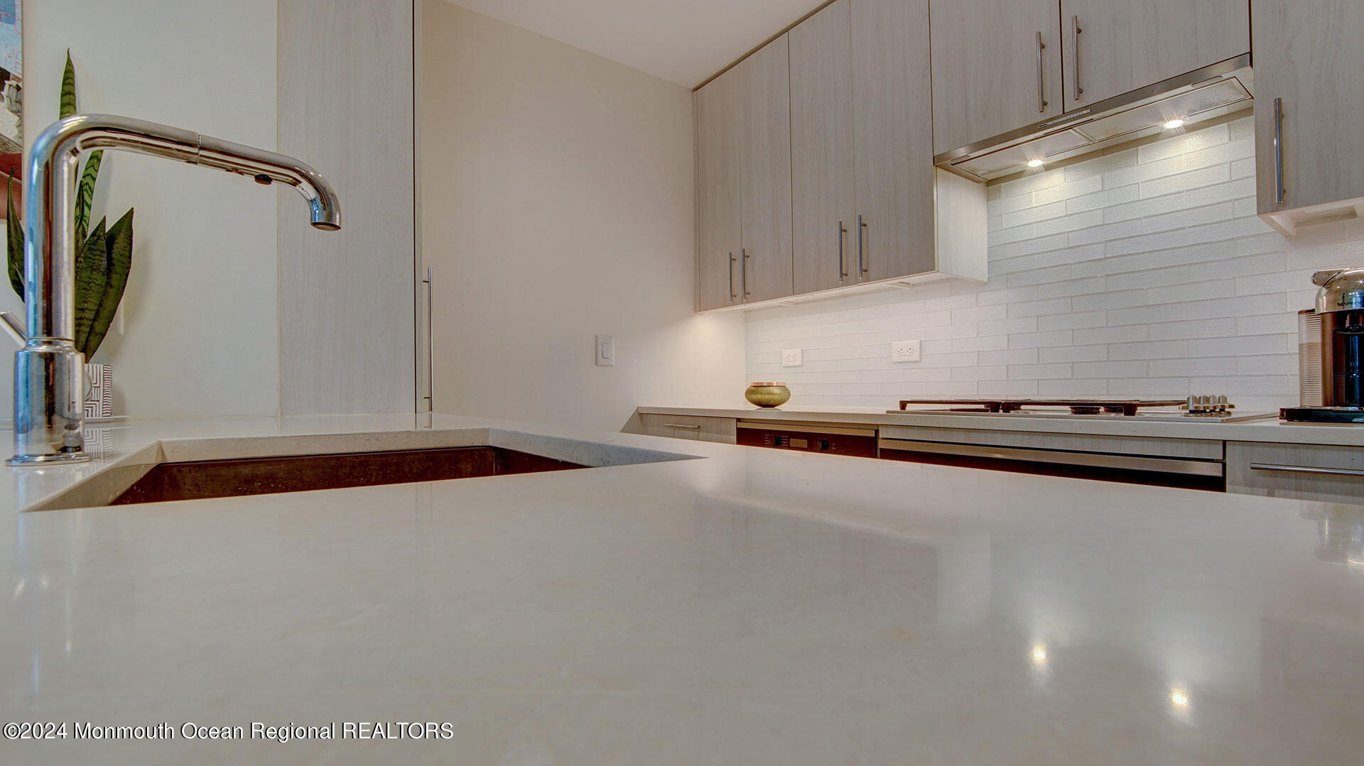 15 Morris Avenue, Unit 307 Long Branch, NJ 07740 - Photo 12 of 33 a view of a room with gym equipment