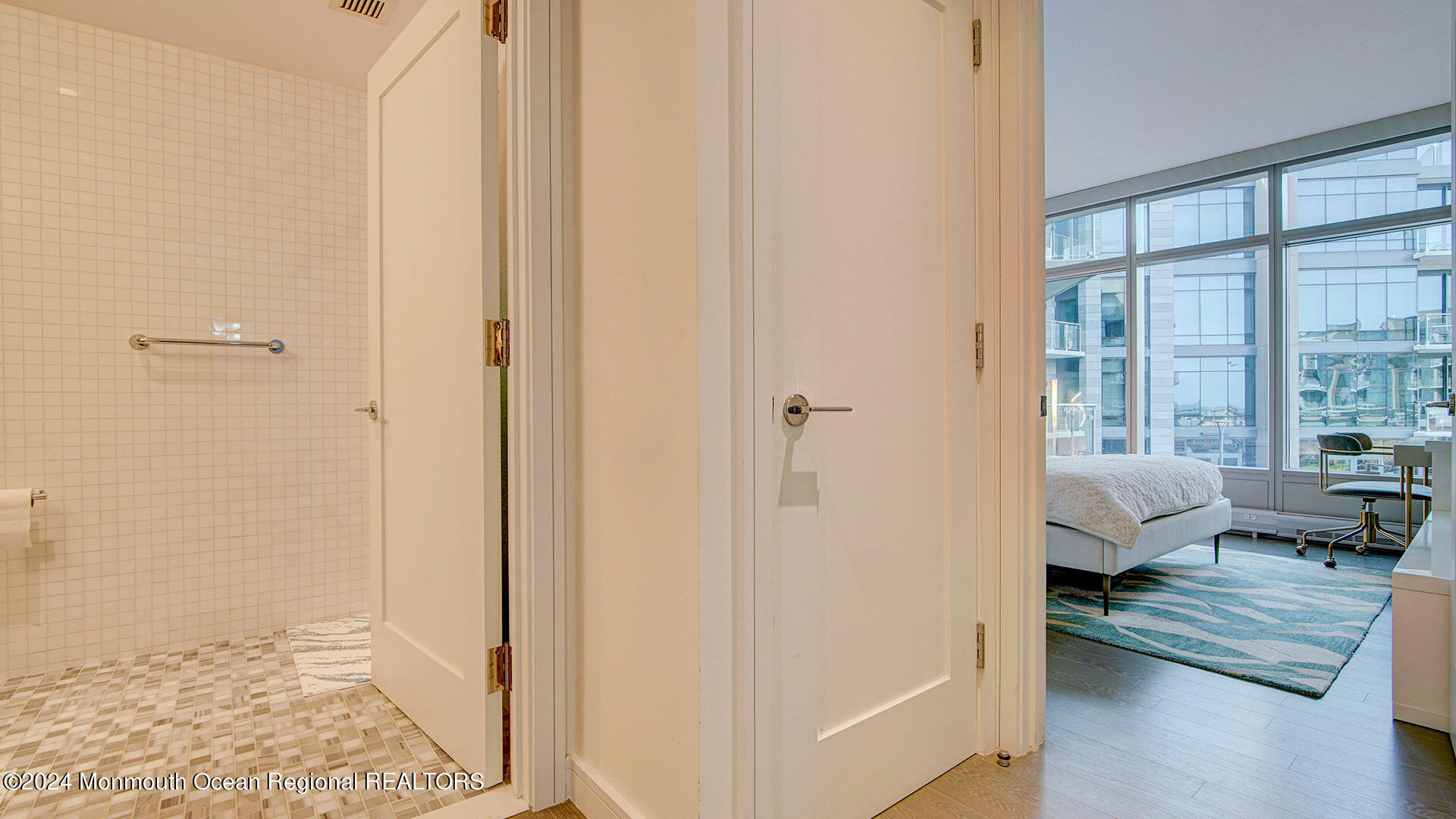 15 Morris Avenue, Unit 307 Long Branch, NJ 07740 - Photo 14 of 33 a view of a bedroom with furniture and window