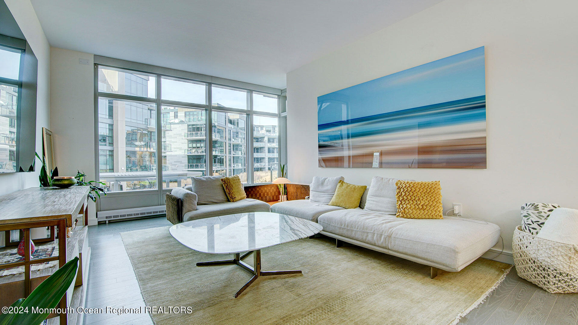 15 Morris Avenue, Unit 307 Long Branch, NJ 07740 - Photo 2 of 33 a living room with furniture and a large window