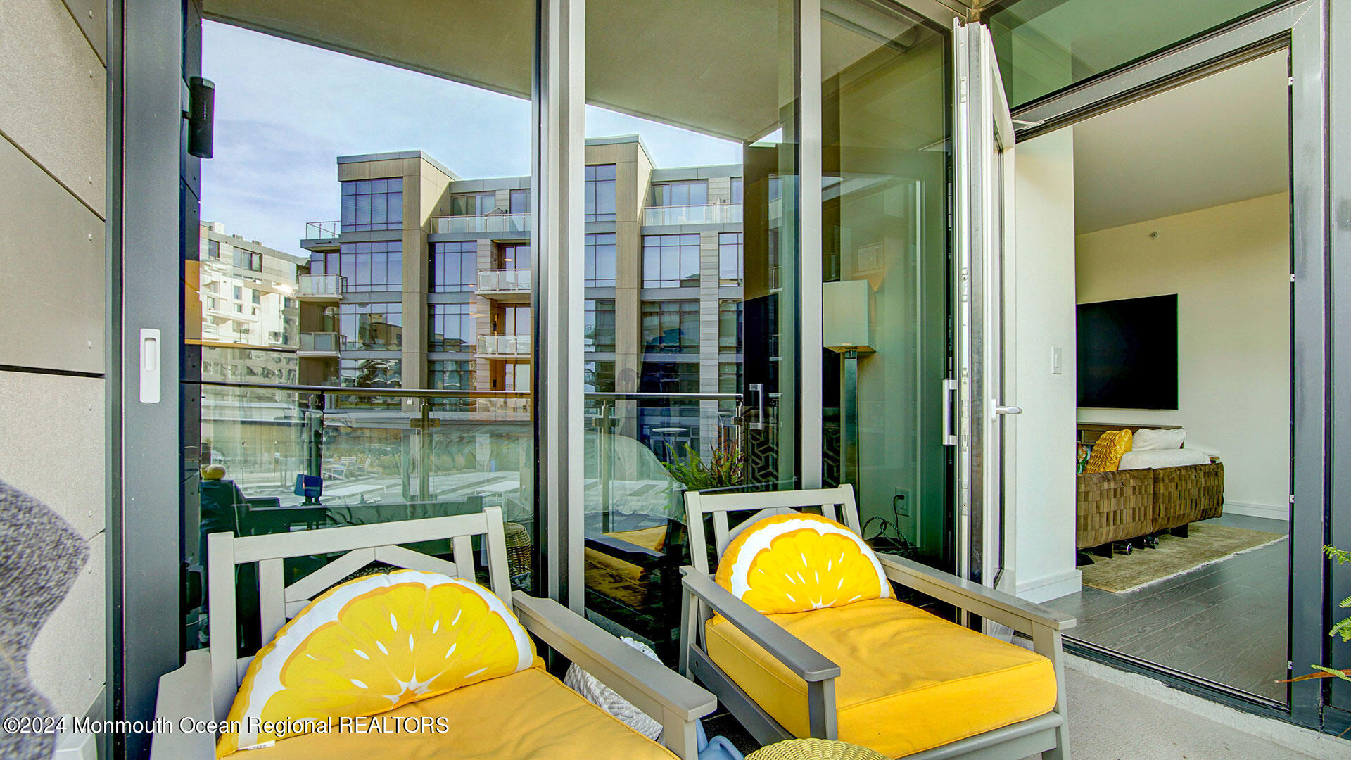 15 Morris Avenue, Unit 307 Long Branch, NJ 07740 - Photo 29 of 33 a view of swimming pool from a balcony