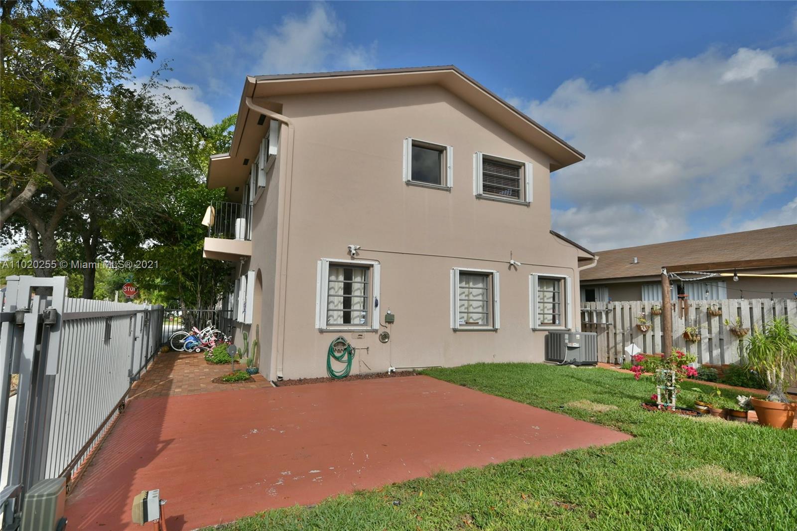 3141 Southwest 27th Terrace, Unit B Miami, FL 33133 - Photo 14 of 15 a front view of house with yard and green space