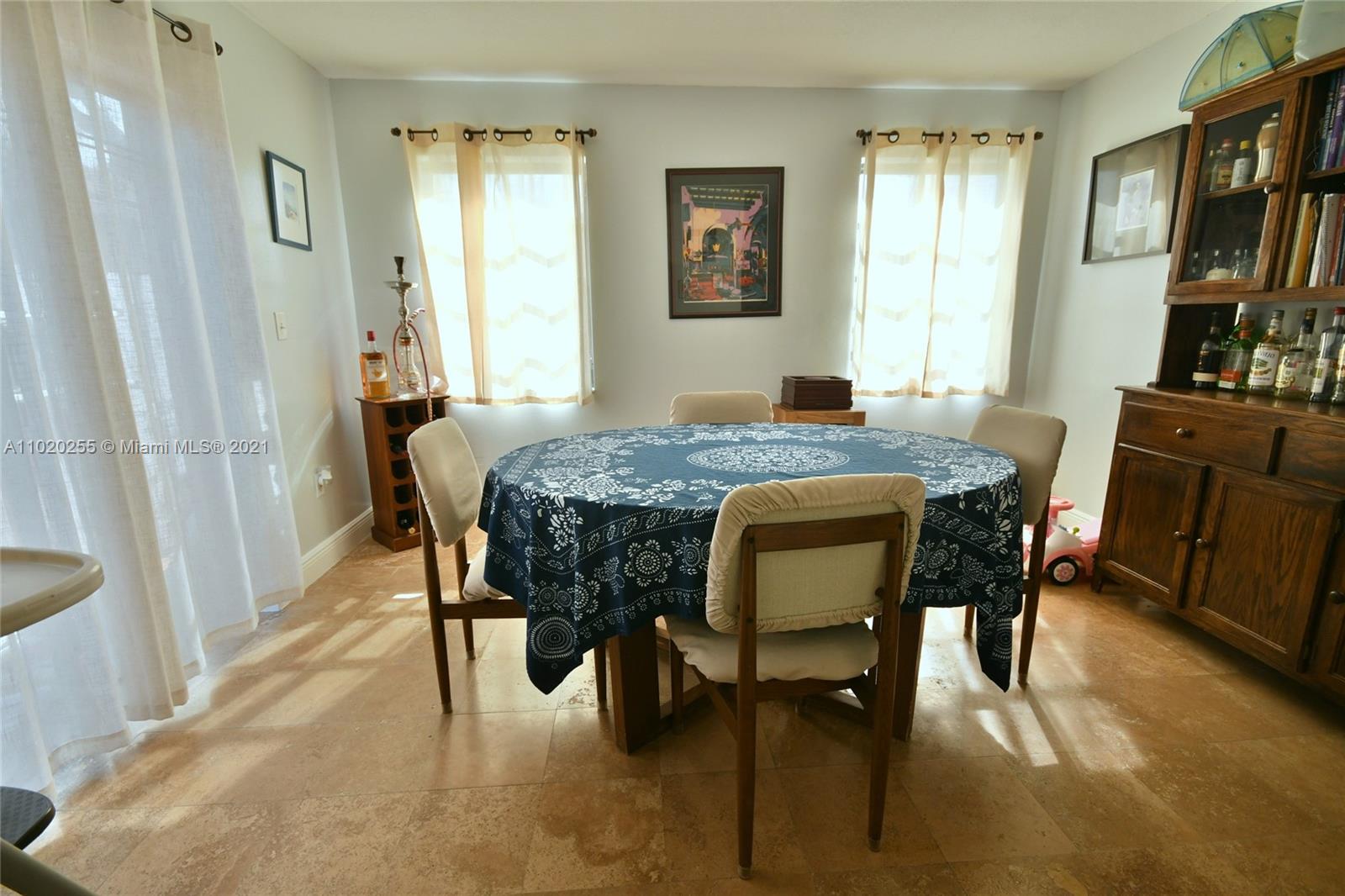 3141 Southwest 27th Terrace, Unit B Miami, FL 33133 - Photo 6 of 15 a dining room with furniture and window