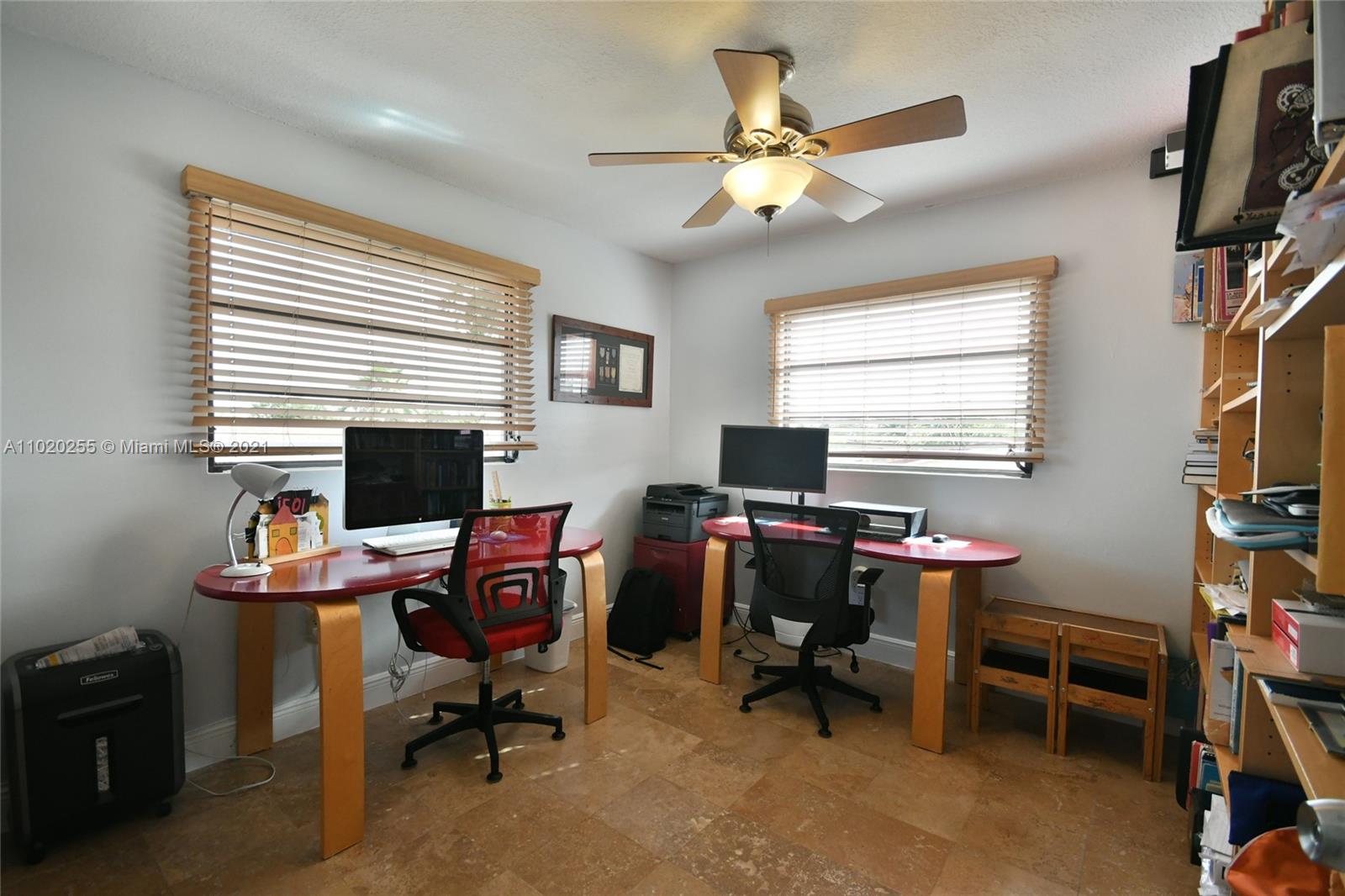 3141 Southwest 27th Terrace, Unit B Miami, FL 33133 - Photo 10 of 15 a view of a workspace with furniture and a window