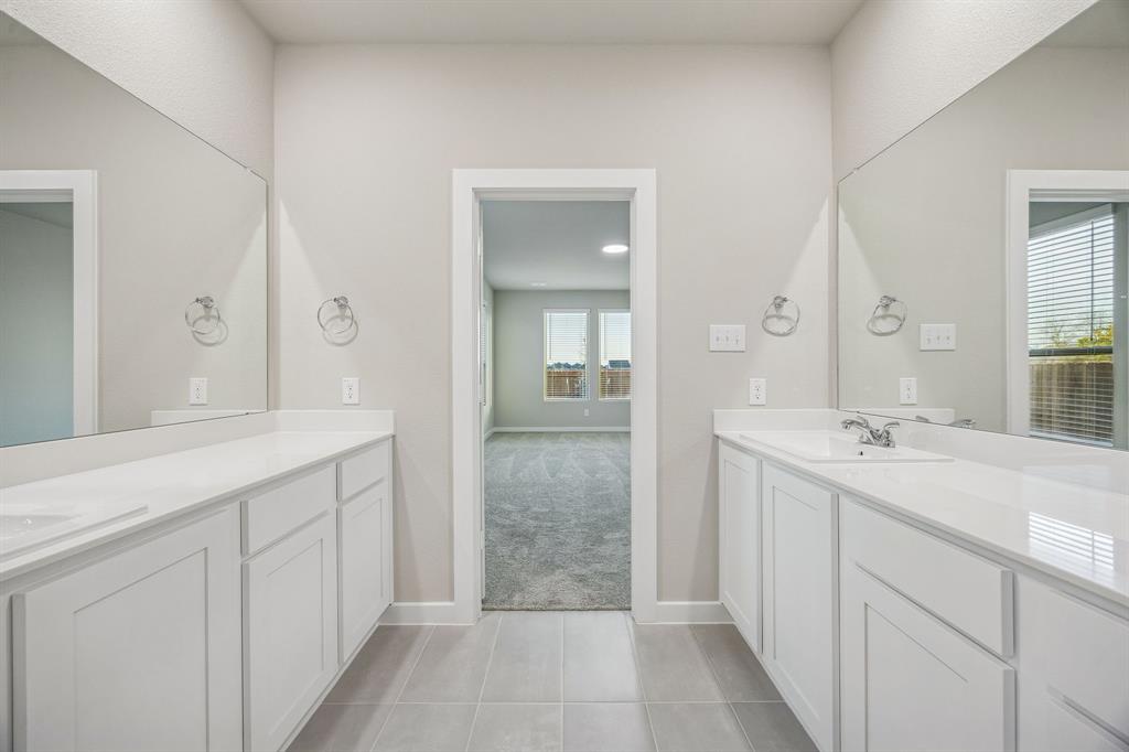 1404 Companero Street Haslet, TX 76052 - Photo 23 of 40 Primary Bathroom in the Wimbledon home plan by Trophy Signature Homes – REPRESENTATIVE PHOTO