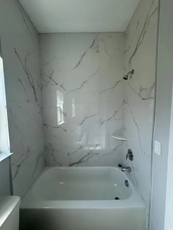 a bathroom with a bathtub