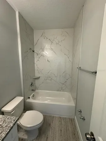 a bathroom with a sink and a toilet