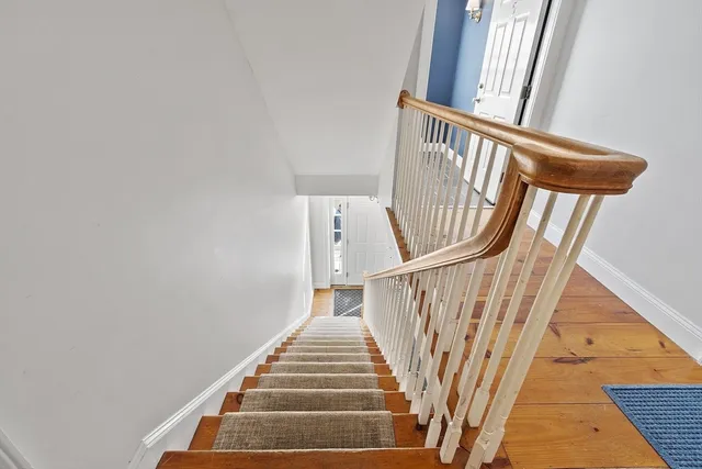 a view of front door with stairs