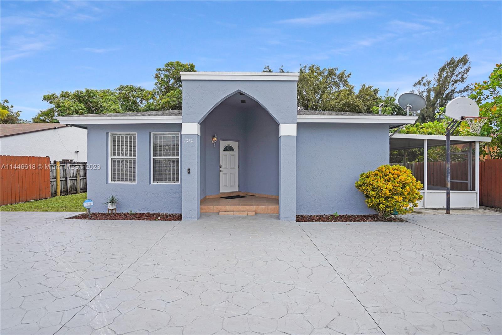 1330 Sesame Street Opa-Locka, FL 33054 - Photo 1 of 27 a view of outdoor space and yard