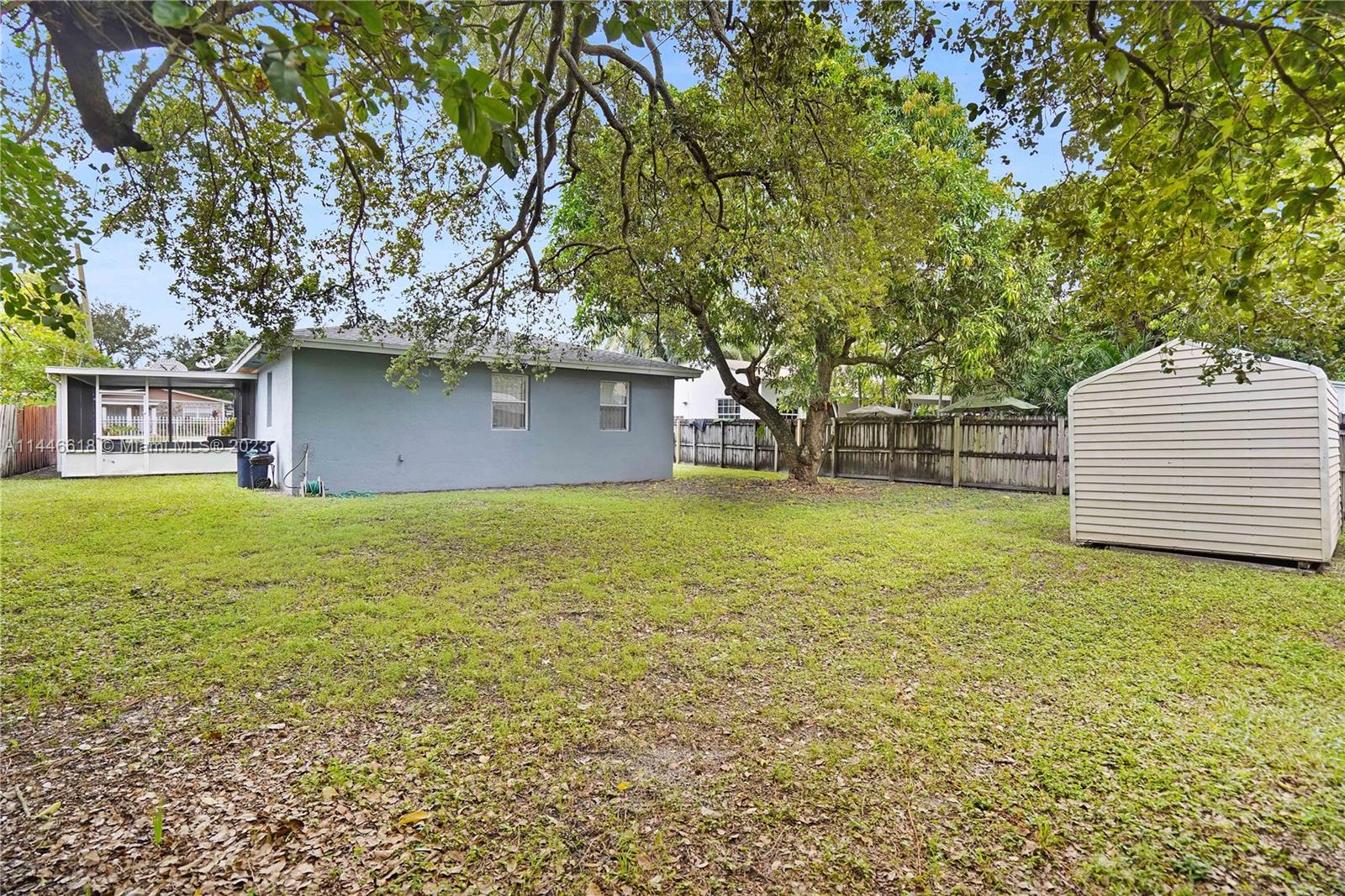 1330 Sesame Street Opa-Locka, FL 33054 - Photo 22 of 27 a house view with a garden space