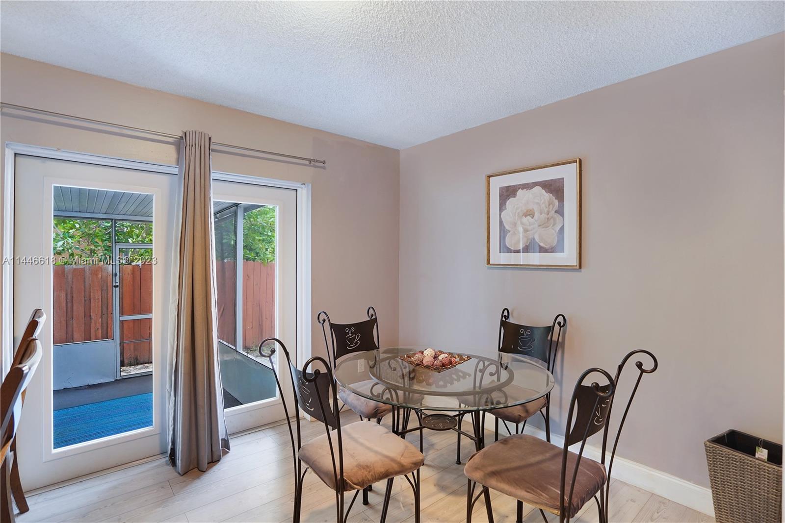 1330 Sesame Street Opa-Locka, FL 33054 - Photo 9 of 27 a view of a dining room with furniture window and outside view