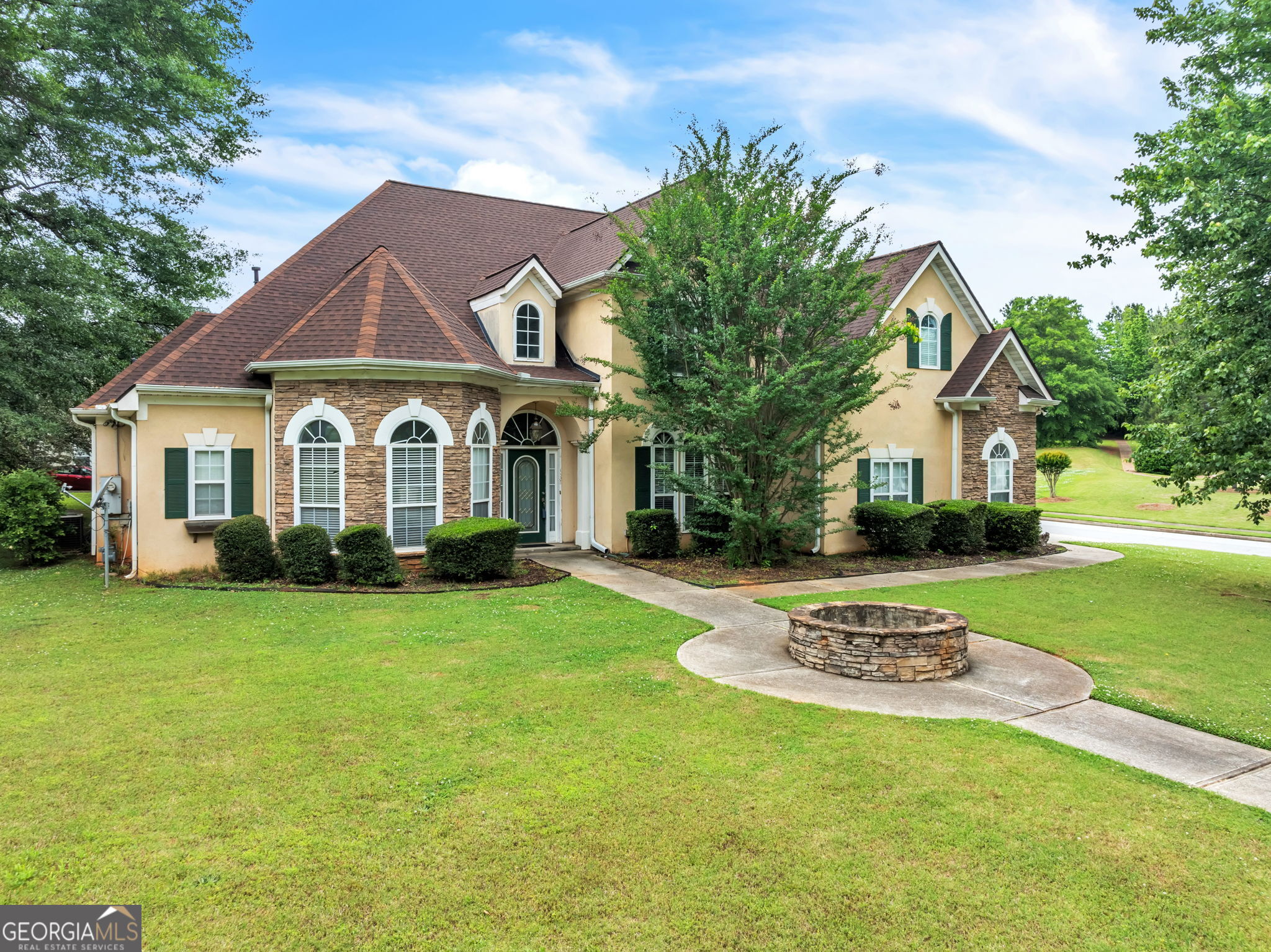 432 Aviemore Loop McDonough, GA 30253 - Photo 1 of 1 a front view of a house with a yard