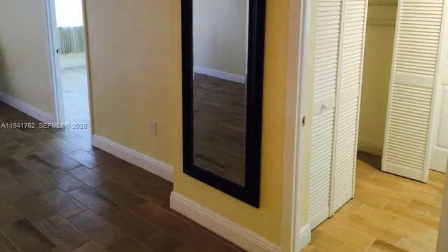 a view of workspace with wooden floor
