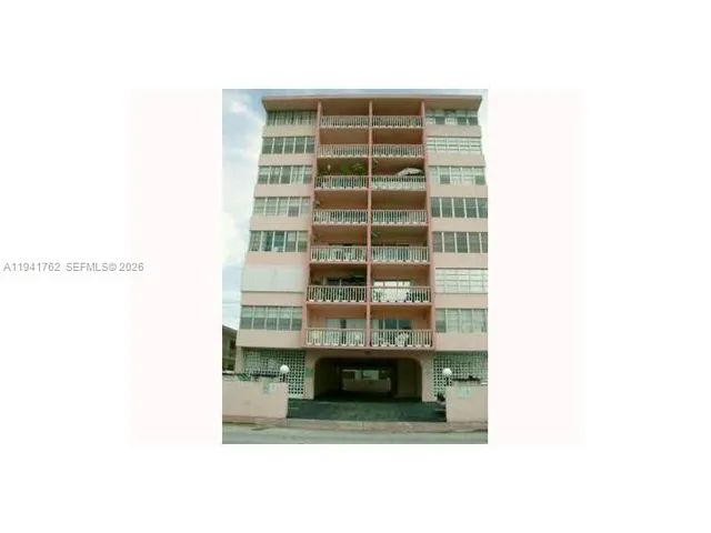 a bathroom with a glass door shower