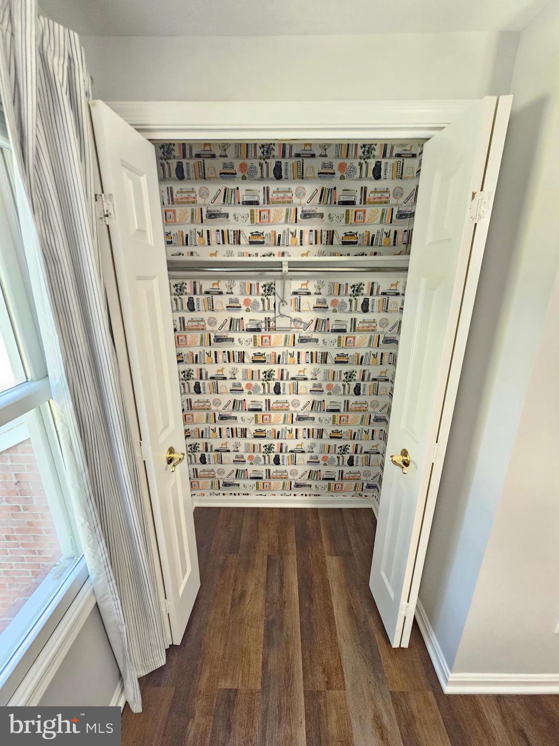 11321 Classical Lane Silver Spring, MD 20901 - Photo 30 of 66 a view of wooden floor with a large window