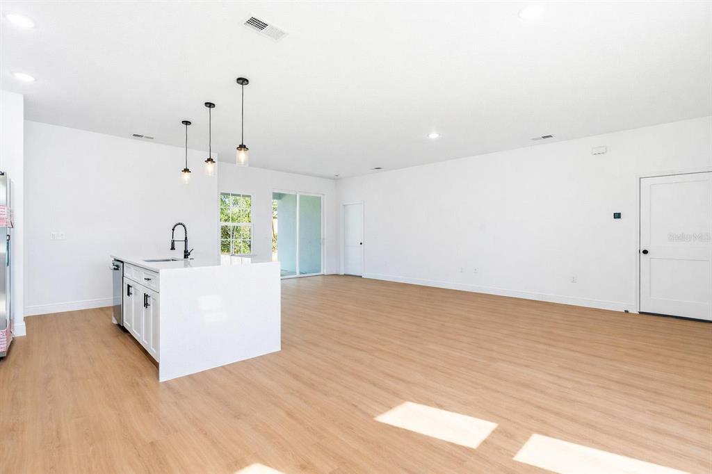 5227 Southwest 165th St Road Ocala, FL 34473 - Photo 5 of 37 a view of a kitchen with electric appliances