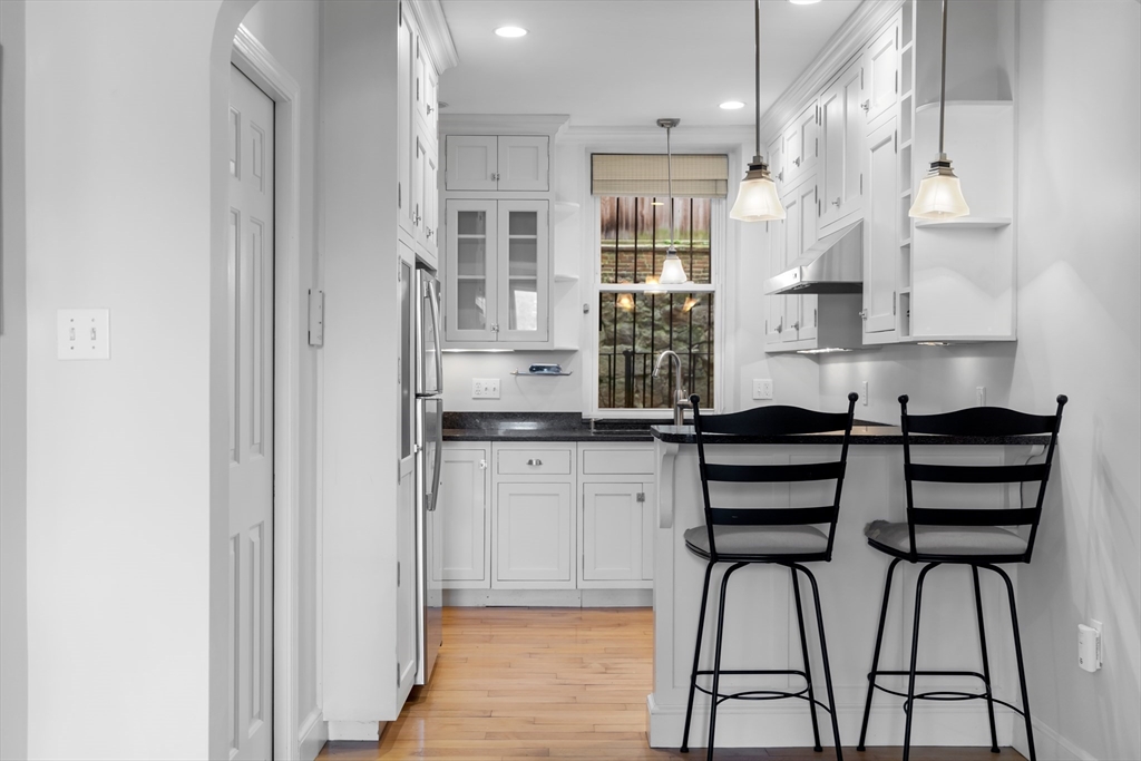 54 Myrtle Street, Unit 1 Boston, MA 02114 - Photo 1 of 14