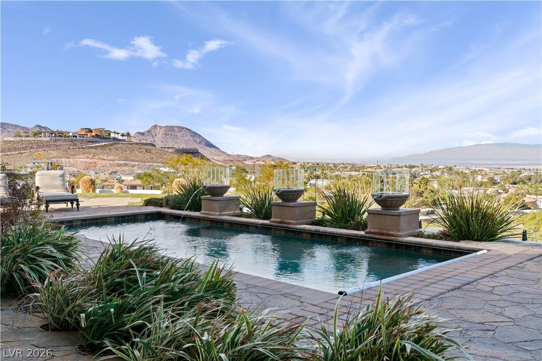 1123 Christian Road Henderson, NV 89002 - Photo 59 of 94 Unwind by the inviting pool with mesmerizing desert mountain views.