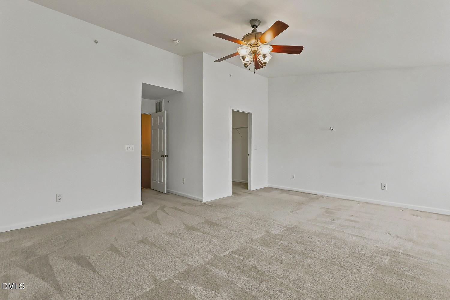 8620 Neuse Club Lane, Unit 107 Raleigh, NC 27616 - Photo 20 of 33 020-017-Primary Bedroom-1500x1000