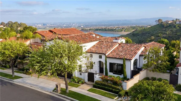 an aerial view of house with yard