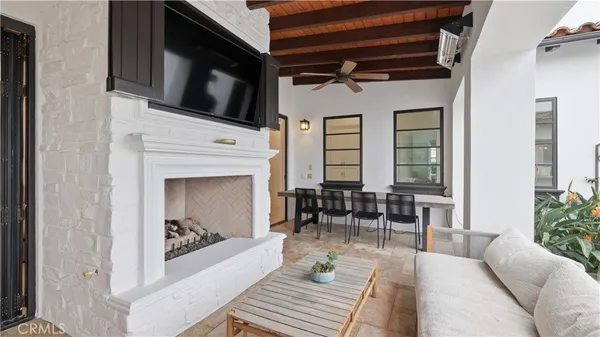 a open kitchen with stainless steel appliances granite countertop a sink a stove and a wooden floors