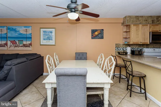 a kitchen with a sink cabinets and stainless steel appliances