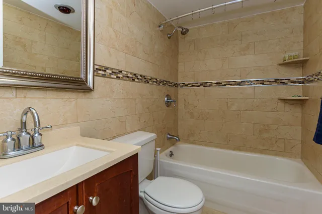 a view of swimming pool with outdoor seating