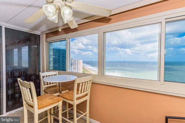 a bedroom with a bed and ceiling fan