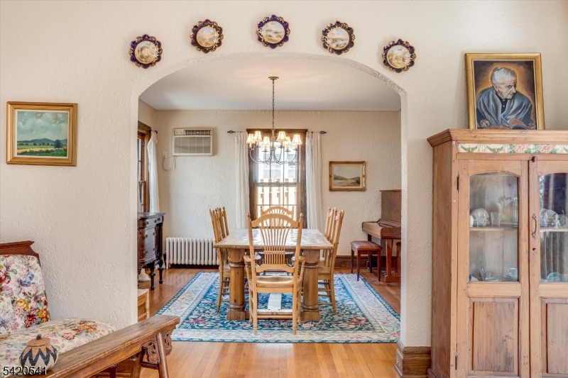 55 Luddington Road West Orange, NJ 07052 - Photo 13 of 40 a view of a dining room with furniture window and wooden floor