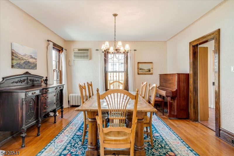55 Luddington Road West Orange, NJ 07052 - Photo 14 of 40 a view of a dining room with furniture window and wooden floor