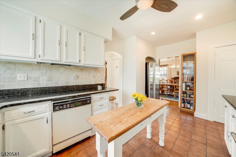 55 Luddington Road West Orange, NJ 07052 - Photo 23 of 40 a kitchen with stainless steel appliances granite countertop a lot of counter space and cabinets