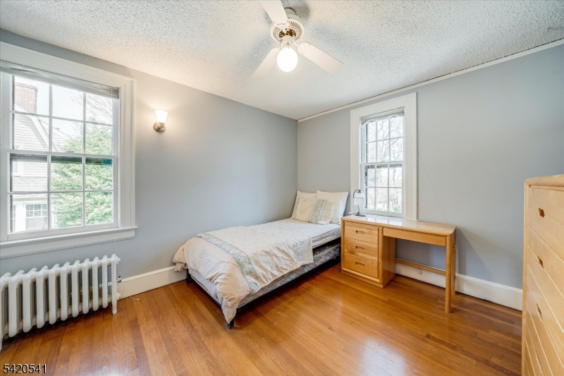55 Luddington Road West Orange, NJ 07052 - Photo 30 of 40 a bedroom with a bed and a window