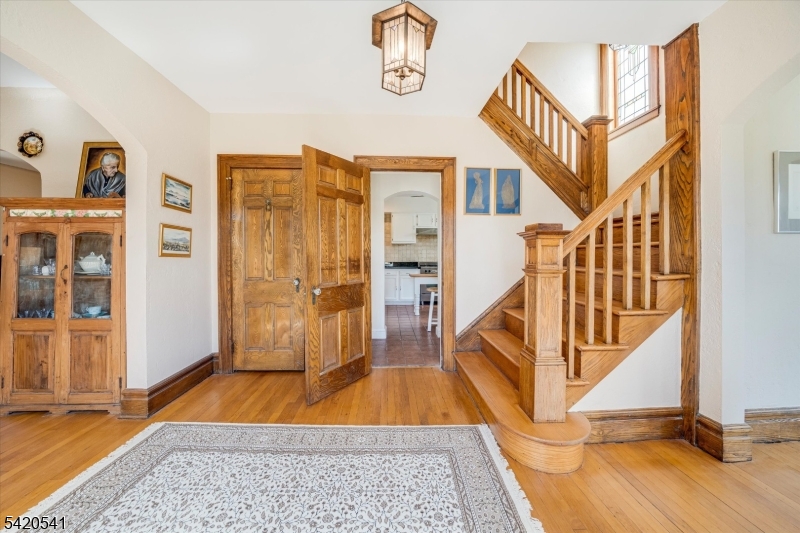 55 Luddington Road West Orange, NJ 07052 - Photo 3 of 40 a view of entryway and hall with wooden floor