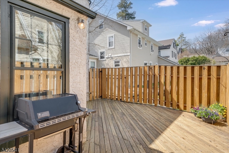 55 Luddington Road West Orange, NJ 07052 - Photo 39 of 40 a view of balcony with furniture and wooden floor