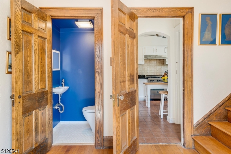 55 Luddington Road West Orange, NJ 07052 - Photo 4 of 40 a bathroom with a sink and a mirror