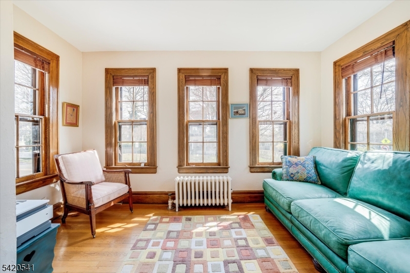 55 Luddington Road West Orange, NJ 07052 - Photo 7 of 40 a living room with furniture and a window