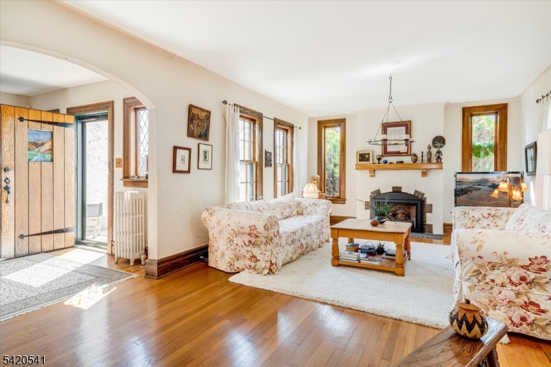 55 Luddington Road West Orange, NJ 07052 - Photo 10 of 40 a living room with furniture and wooden floor