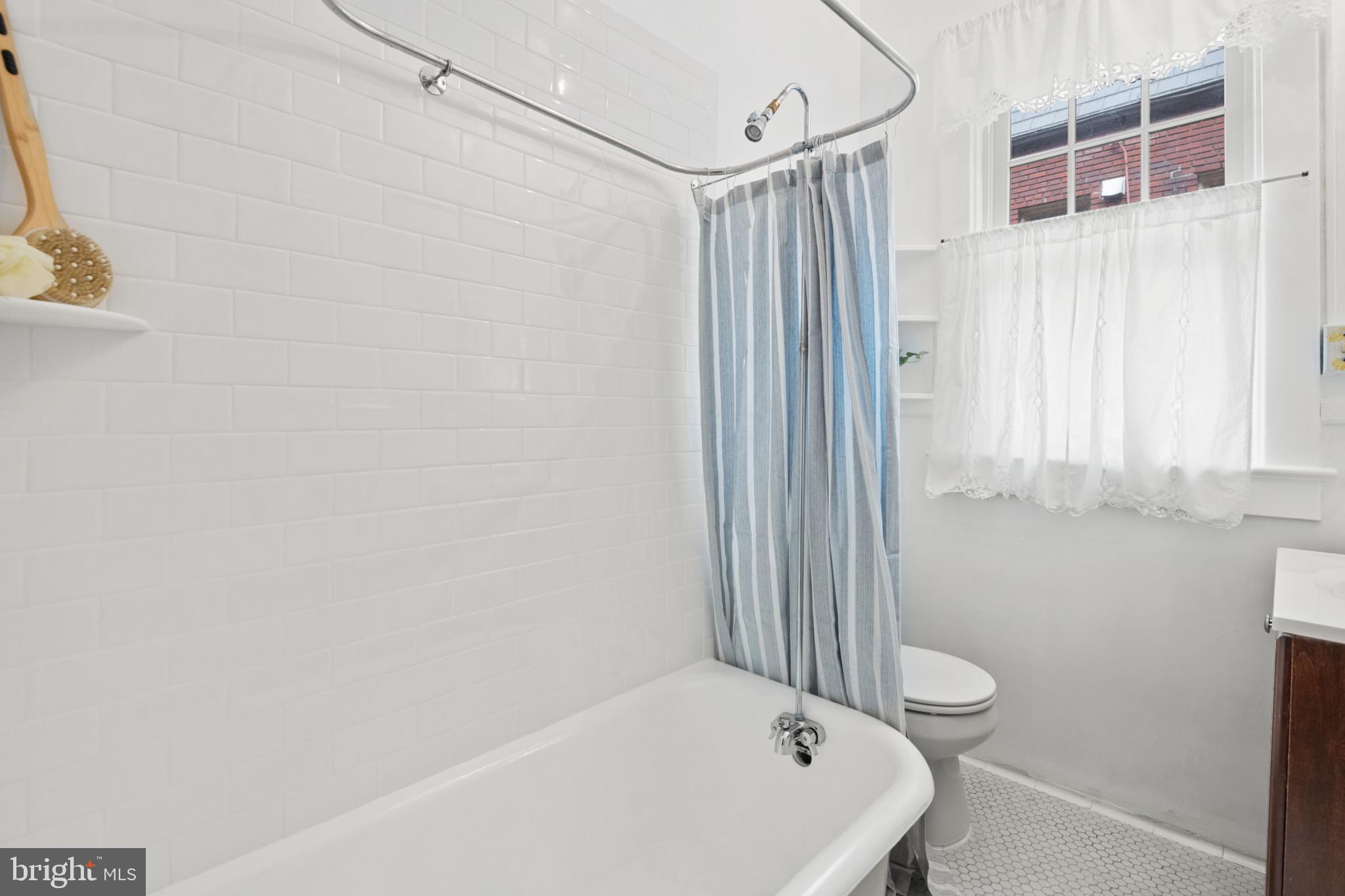 3024 Porter Street Northwest, Unit 204 Washington, DC 20008 - Photo 29 of 37 Bath Freshly Tiled and Glazed