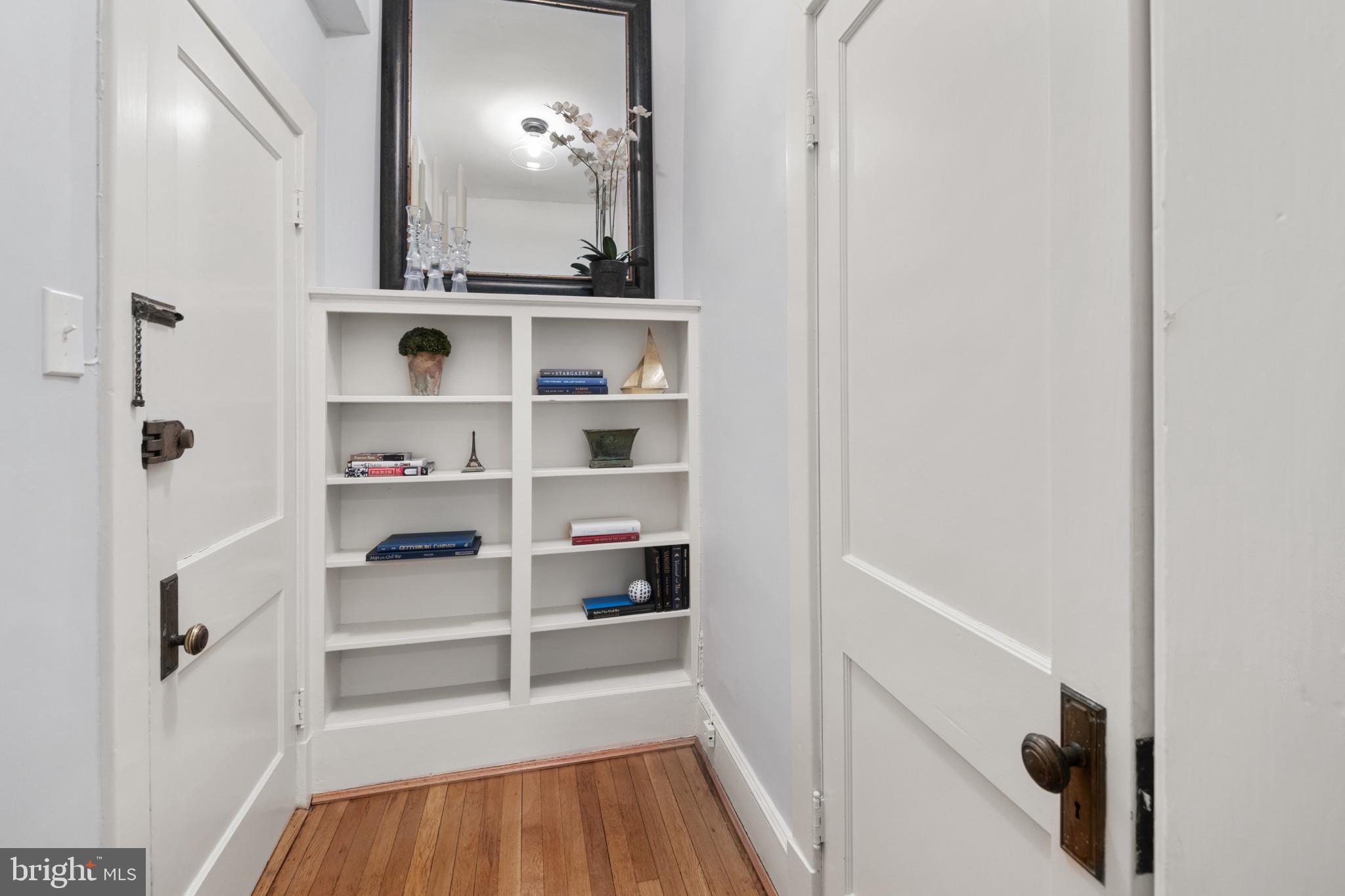 3024 Porter Street Northwest, Unit 204 Washington, DC 20008 - Photo 8 of 37 Built-ins with deep Entry Closet
