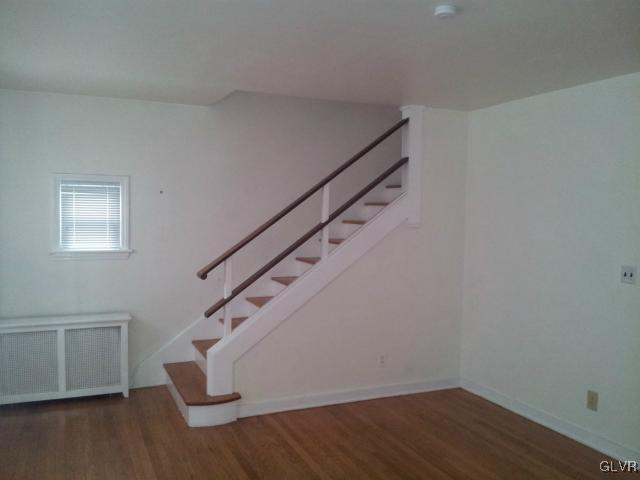 2110 Center Street Bethlehem, PA 18017 - Photo 8 of 12 a view of entryway with stairs and wooden floor