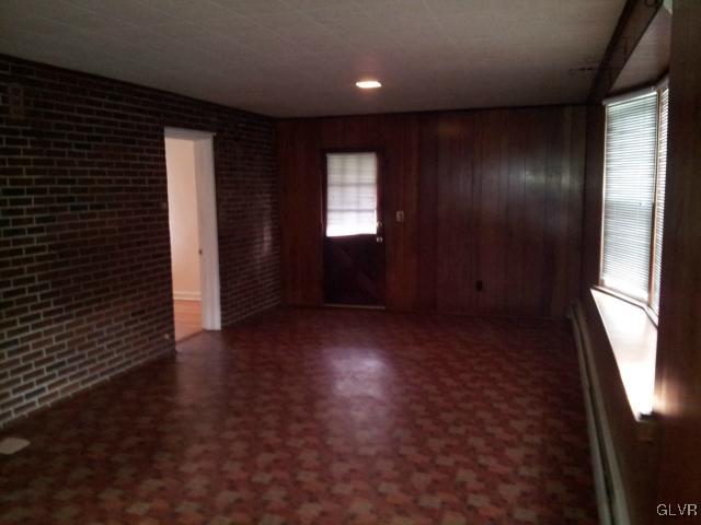 2110 Center Street Bethlehem, PA 18017 - Photo 9 of 12 an empty room with wooden floor and windows