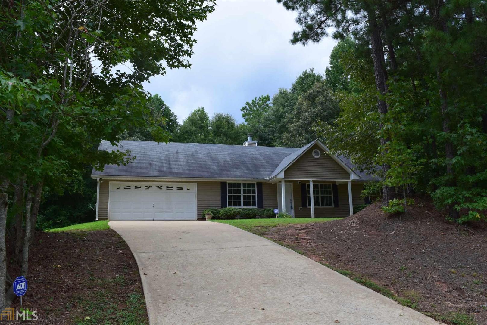 101 Jenny Road Grantville, GA 30220 - Photo 1 of 1 a house with trees in the background