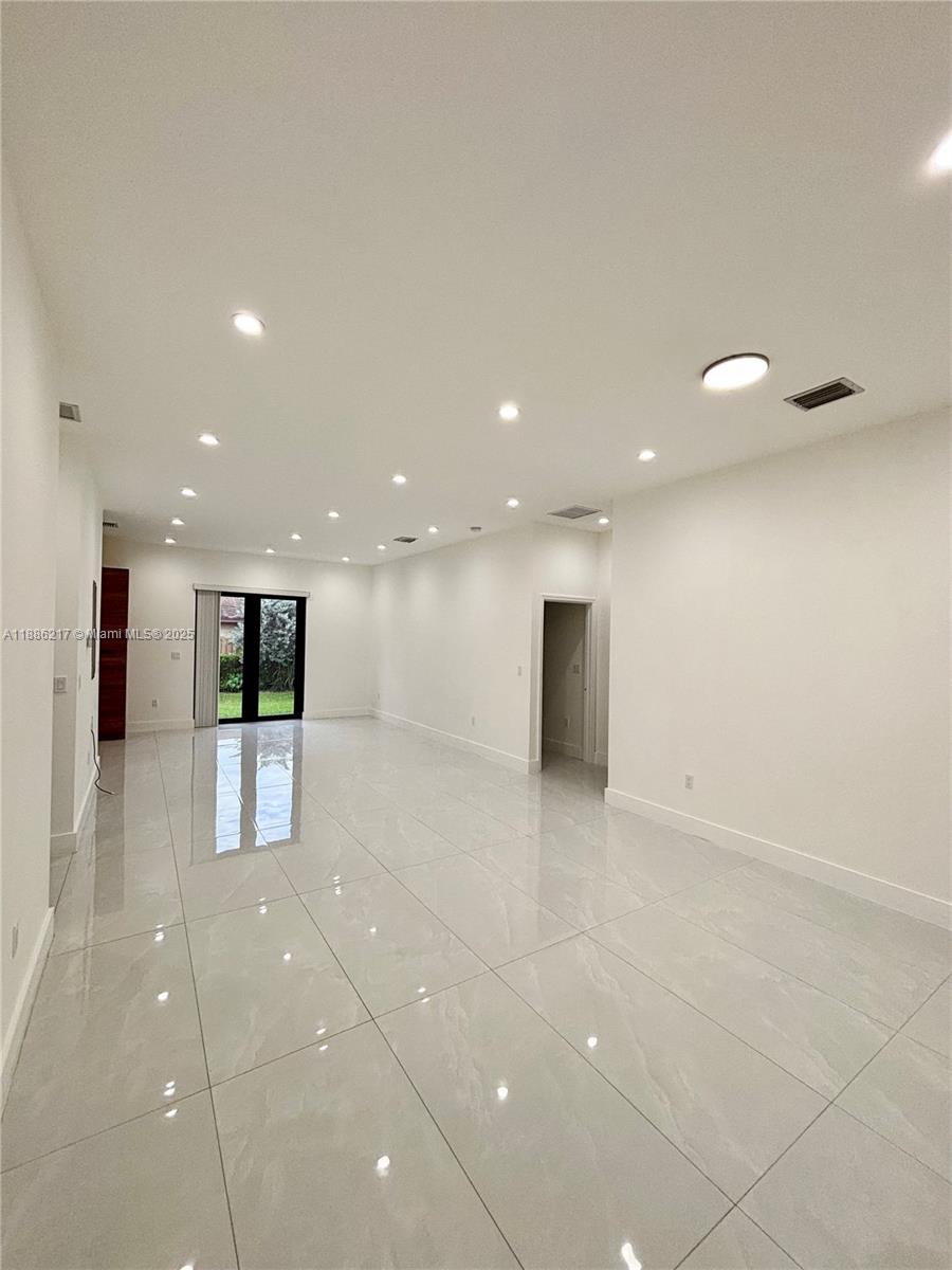 5737 Cleveland Street, Unit 2 Hollywood, FL 33021 - Photo 4 of 18 a view of a hallway