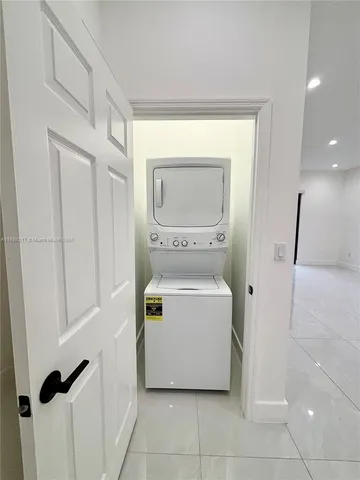 a view of a storage & utility room with washer and dryer