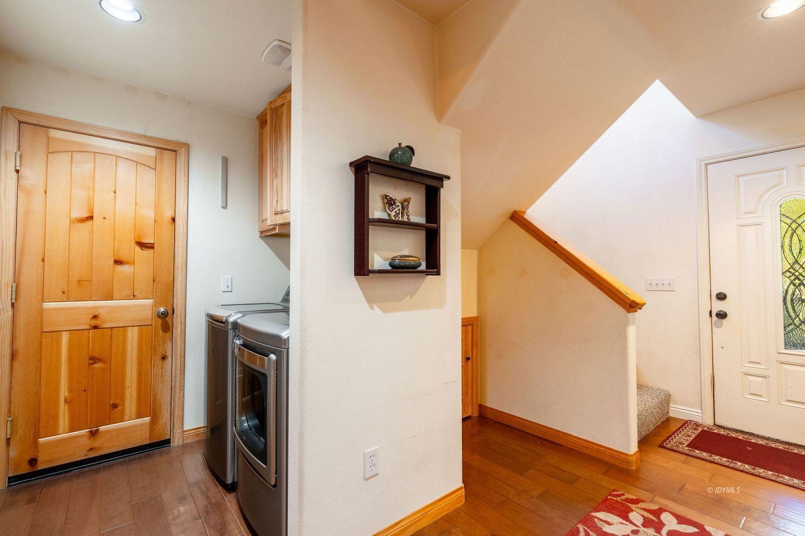 25262 Deer Path Road Idyllwild, CA 92549 - Photo 21 of 45 a view of a hallway with washer and dryer