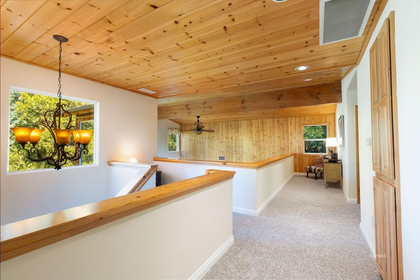 25262 Deer Path Road Idyllwild, CA 92549 - Photo 31 of 45 a living room with a furniture and a flat screen tv