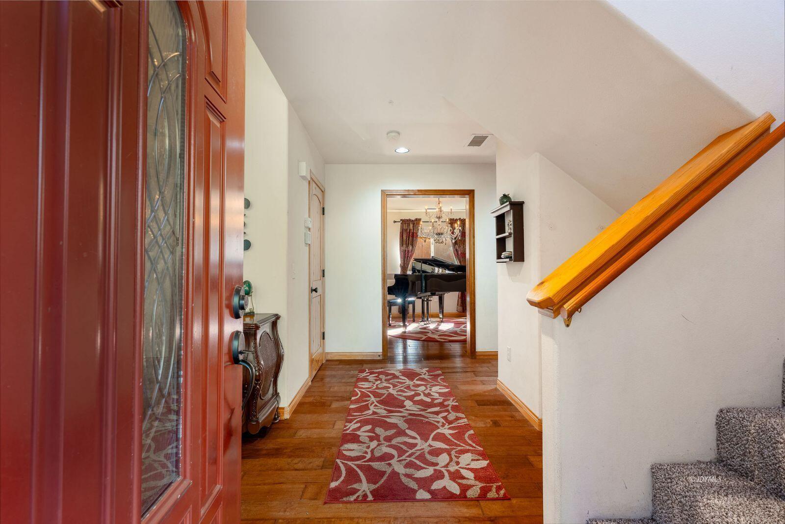 25262 Deer Path Road Idyllwild, CA 92549 - Photo 7 of 45 a view of hallway with furniture and a rug
