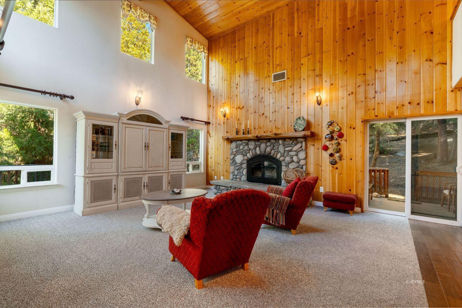 25262 Deer Path Road Idyllwild, CA 92549 - Photo 8 of 45 a living room with furniture and a fireplace