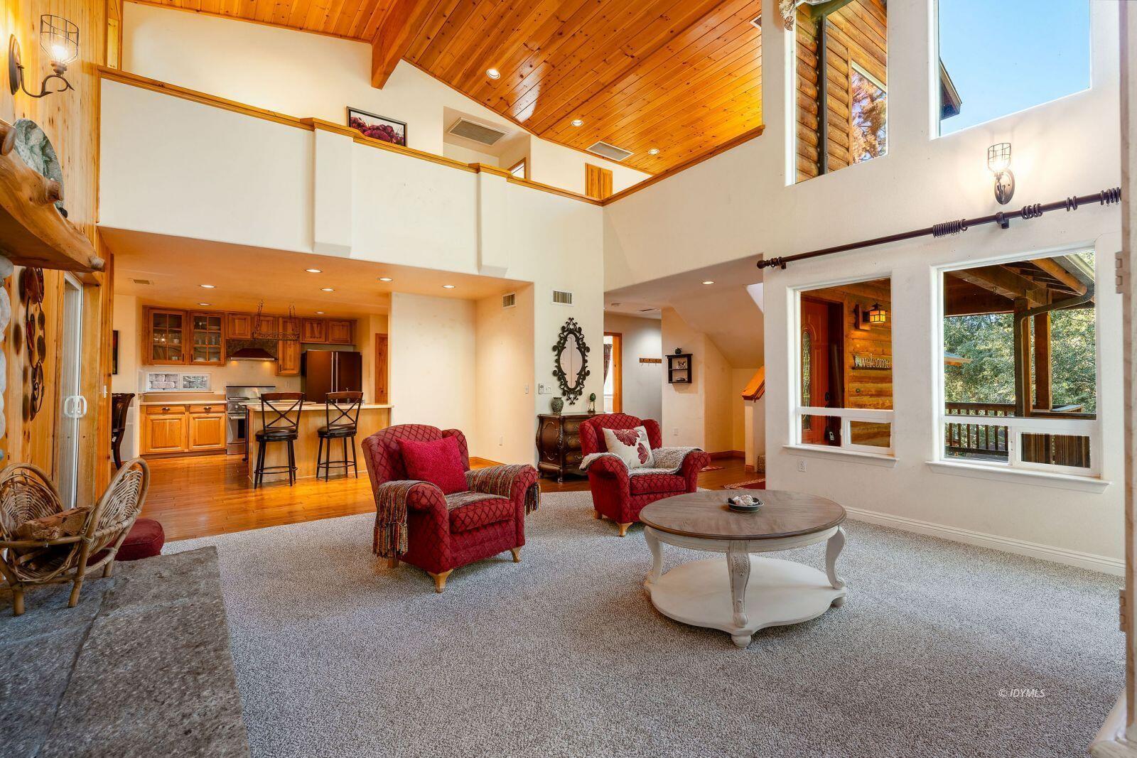 25262 Deer Path Road Idyllwild, CA 92549 - Photo 10 of 45 a living room with patio furniture and a potted plant
